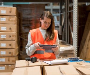 medium shot woman with tablet